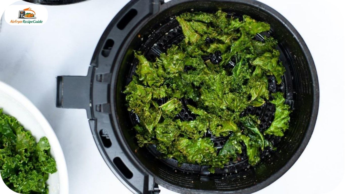 Kale chips cooking inside air fryer basket